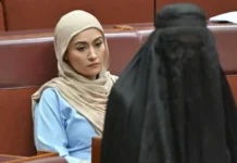 Australian Senator Pauline Hanson Suspended Over Burka Stunt in Parliament