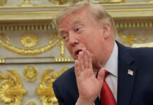 White House attacks CNN reporter over question about Trump aide